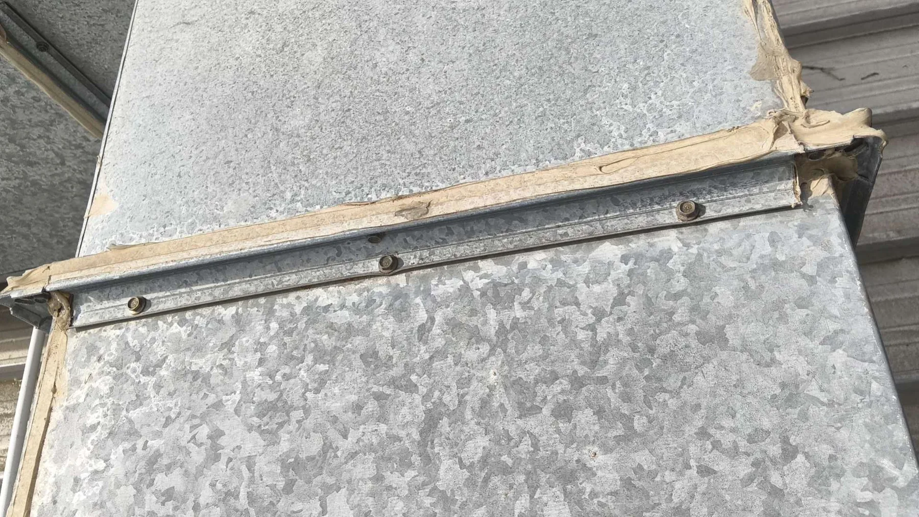 Metal gutter seam and joint detail