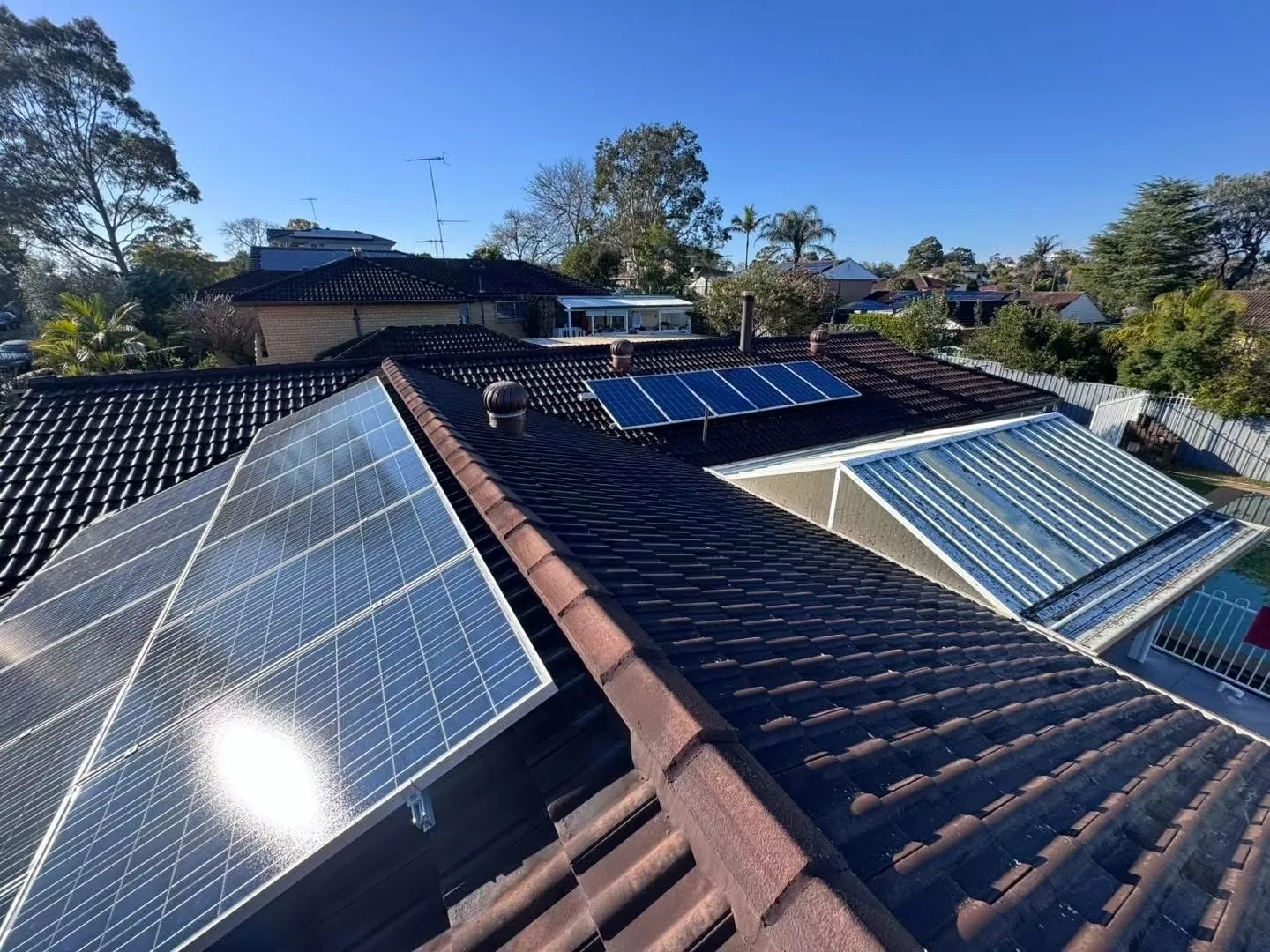 Tiled roof overview with solar panels