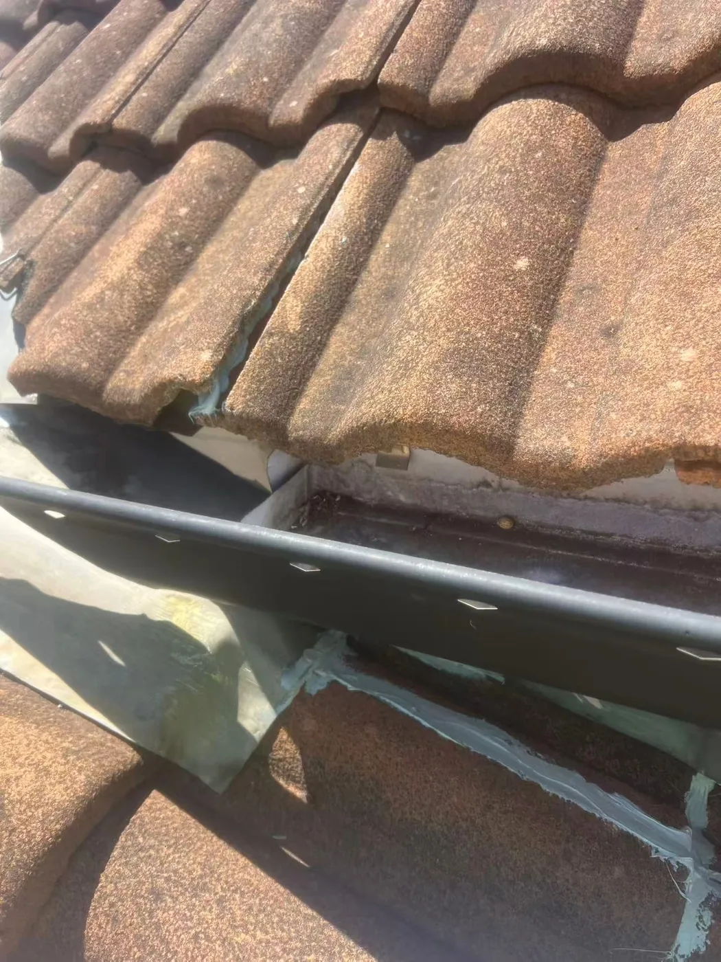 Close view along a roof valley channel